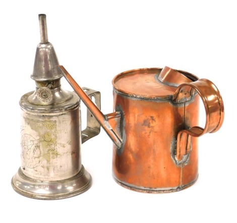 An early 20thC Helix copper oil can, 9034/54, 13.5cm high, together with a Clamfor pigeon oil lamp, 17.5cm high. (2)