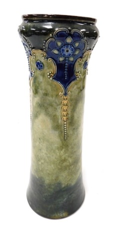 A late 19thC Royal Doulton stoneware vase, moulded with stylised flowers and trailing leaves, on a blue, pale and dark green ground, impressed marks, 33cm high.