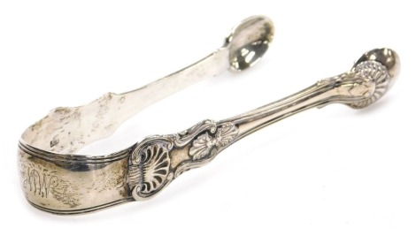 A pair of George IV silver Kings pattern sugar tongs, monogram engraved, John Wright, Newcastle 1828, 2.02oz