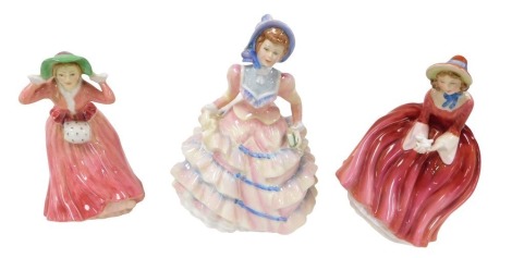 A Royal Doulton figure modelled as Hannah HN3369, another of Denise HN2273 and an Alton figure modelled as Autumn Winds. (3)