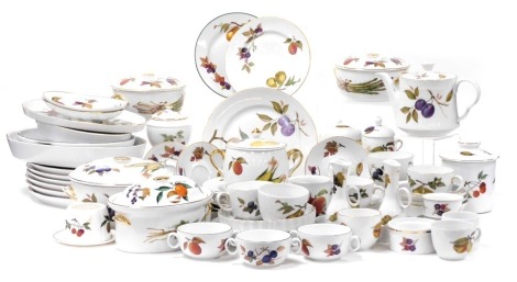 A group of Royal Worcester Evesham pattern oven to table wares, including tureens and covers, and oval dishes, together with oval and circular plates, tea wares, ramekins and preserve jars etc. (qty)