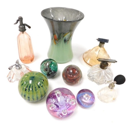 A group of 20thC glass, including five art deco atomisers, Strathearn glass vase, Caithness Moonflower paperweight, further paperweight, possibly Mdina. (qty)