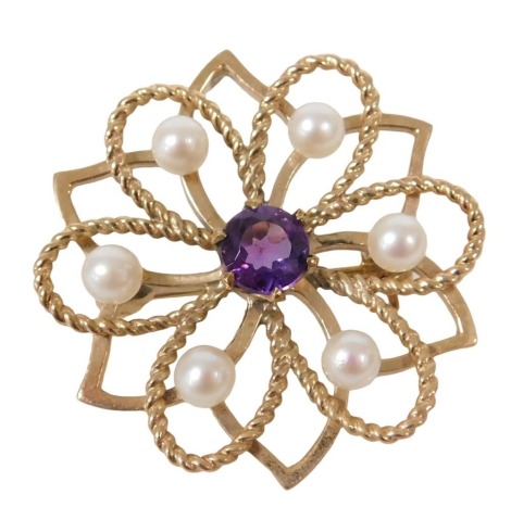 A 9ct gold amethyst and seed pearl brooch, in a floral openwork design, 5.2g all in.