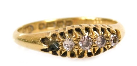 An 18ct gold and diamond five stone ring, set with rose cut diamonds, in a claw setting, size N, 2.5g all in.