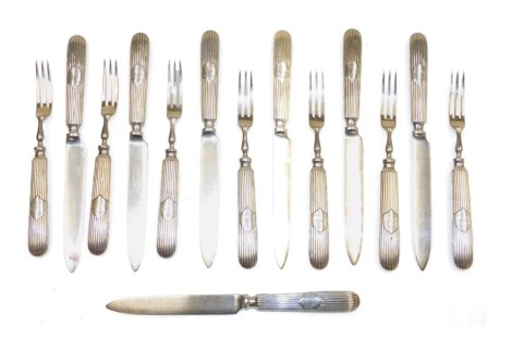 Fourteen early 20thC silver plated fruit knives and forks, the handles with a shield reserve engraved 'Red Lion Hotel, Boston.