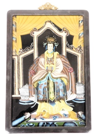 A 20thC Chinese ancestor portrait on glass, depicting a high ranking woman in a seated pose, within a hardwood frame, 47cm x 30cm.