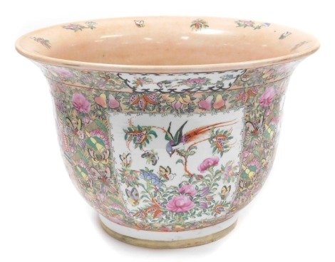 A Chinese Canton porcelain jardiniere, decorated with figures within floral borders, 32cm high, 48cm wide.