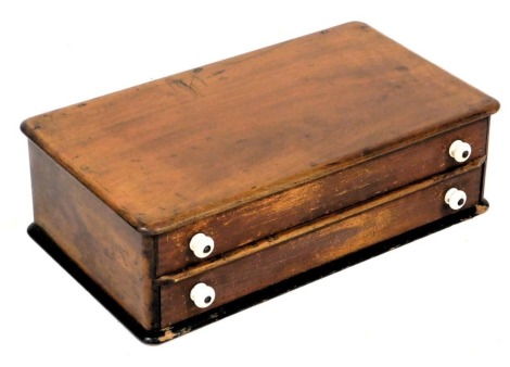 A Victorian mahogany and ebonised collectors chest, of two drawers, 16.5cm high, 54.5cm wide, 31cm deep.