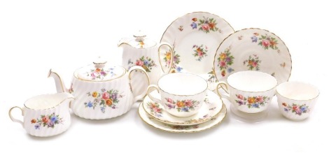 A Minton porcelain Marlow pattern tete-a-tete, printed marks, comprising tea pot, hot water jug, cream jug, sugar bowl, two teacups and saucers and two tea plates.