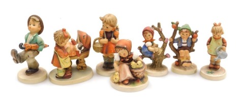 Eight Hummel pottery figures, comprising Doll Mother, School Girl, Happy Traveller, Little Gardener, Chick Girl, Apple Tree Boy and Apple Tree Girl.