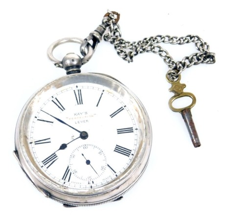 A Kay's "Perfection" lever gentleman's open faced pocket watch, key wind, circular enamel dial bearing Roman numerals, subsidiary seconds dial, the case with engine turned decoration, vacant shield and garter reserve, stamped 935, with key and base metal 