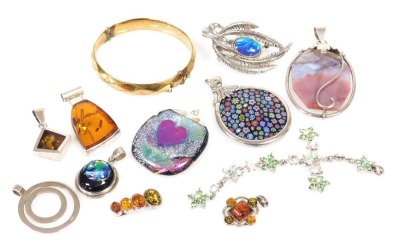 Silver and costume jewellery, including a millefiori pendant, four amber pendants and a gold plated bangle.