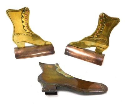 A pair of Victorian copper and brass boot makers ornaments, 11cm wide, and another similar, 14cm wide. (3)