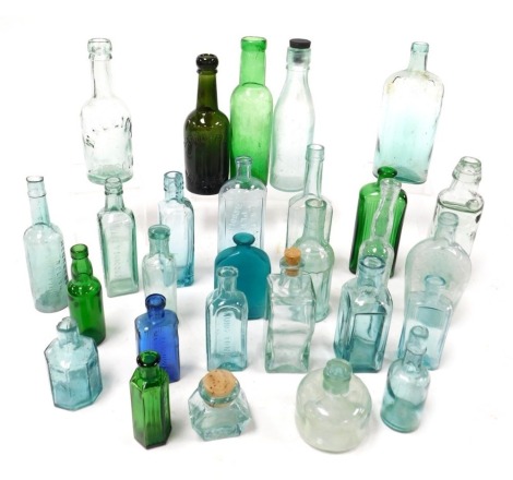 A group of Victorian and later blue and green glass bottles, including Scrubbs fluid, a bottle for W Sleight of Lincoln, poisons bottle and a Mason's Extract bottle. (qty)