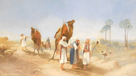 British School (20thC). A desert scene with bedouins, camels, palm trees and a city in the distance, oil on canvas, 85cm x 110cm.