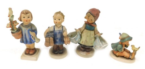 Four Hummel pottery figures, comprising Congratulations, Boots, Mothers' Darling, and Singing Lessons.