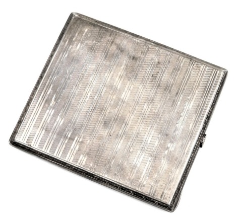 A silver cigarette case, with engine turned decoration, hallmarks worn, 4.42oz.