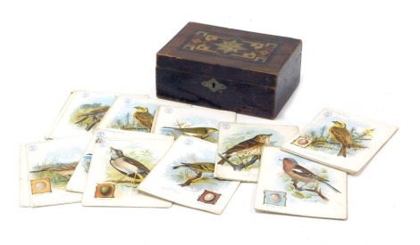 An early 20thC trade cards, the British singer series, ornithological series, with details verso, in a wooden box.