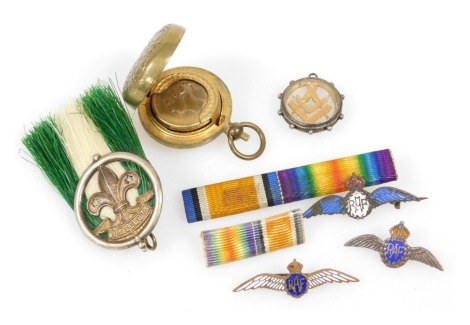 A Victorian Masonic pendant, with set square and compass, three RAF badges, two ribbon bars, a Boy Scouts badge and a Victorian sovereign holder.