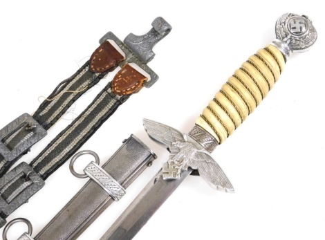 A replica Luftwaffe dagger, 43cm long, together with a pair of dagger hangers, stamped DRGM.