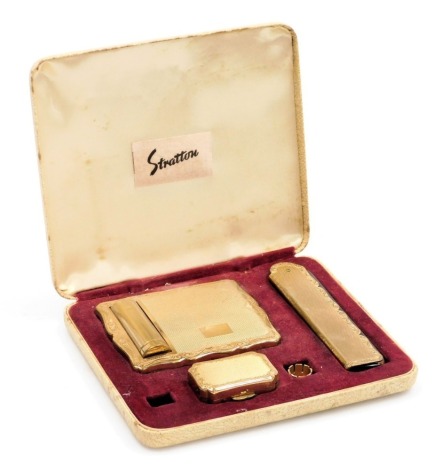 A mid century Stratton lady's compact and lipstick, together with a folding comb and a pill box, cased.