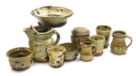 A group of late 20thC studio pottery, including a water jug, bowls, jar and cover, and a vase. (qty)