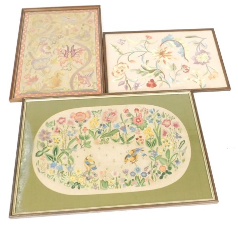 Three early 20thC silkwork pictures, floral studies, framed and glazed, 44cm x 68cm, 70cm x 49cm and 59cm x 89cm.