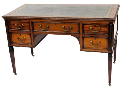 A late 19th/early 20thC mahogany desk in a French style, the rectangular top with a green and gilt leather inset, and leaf guard frieze above an arrangement of five drawers, each with locks stamped Hobbs & Co. of London, on square tapering legs, 74cm high