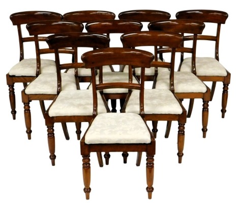 A set of ten early Victorian mahogany dining chairs, each with a plain bar back, a drop in seat, on turned tapering legs.