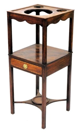 A George III mahogany wash stand, square top with recesses for a bowl and two beakers, above an under tier with inlay drawer, 86cm high, 36cm wide.