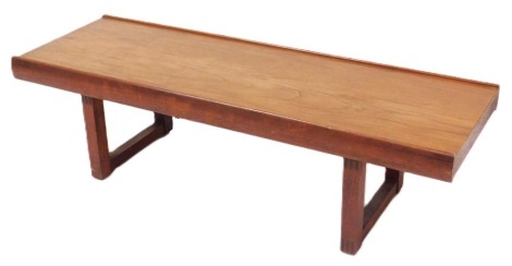 A 1960s Dalescraft teak coffee table, with a rectangular top, on plain supports, 35cm high, 122cm wide.