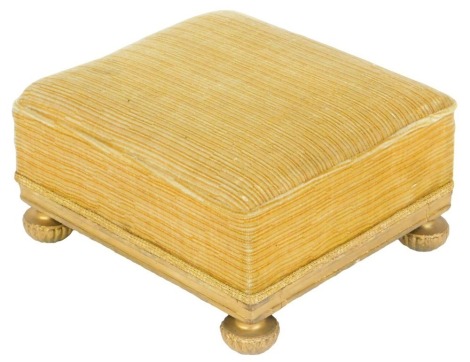 A gilt rectangular stool, upholstered in gold striped fabric, on bun feet, 37cm wide.