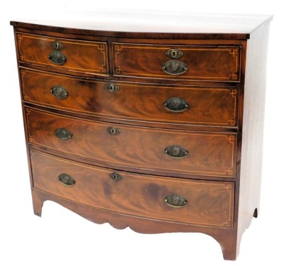 A mahogany and line inlaid bow fronted chest, of two short over three long graduated drawers, raised on bracket supports, circa 1900, 96cm high, 105cm wide, 53cm deep.