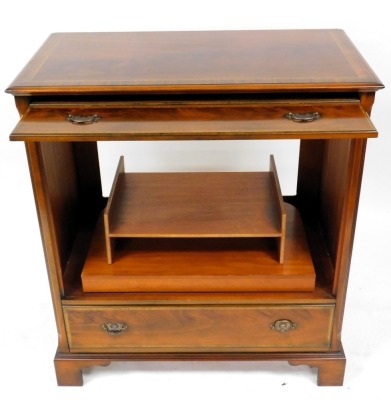 A mahogany and satinwood cross banded television cabinet, formed as a chest of drawers, the rectangular top with a moulded edge, above a top hinged door, formed from a rectangular panel, above four short and two long false drawers, above a real drawer, on - 2