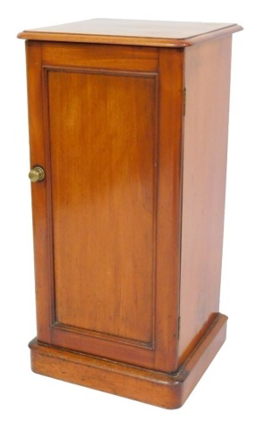 A Victorian mahogany pot cupboard, the rectangular top with a moulded edge, above a single panelled door, on a plinth, 77.5cm high, 38cm wide.