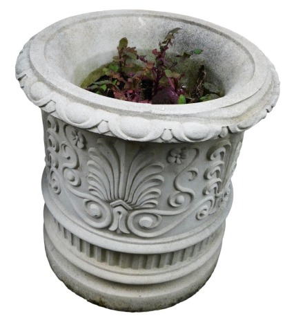 A stone cylindrical planter with egg and dart border, and anthemion banded body, 50cm high, 50cm diameter.