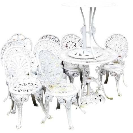 Eight silver and grey painted cast aluminium Victorian style garden chairs, each on cabriole legs and two garden tables, 68cm high, 85cm diameter.