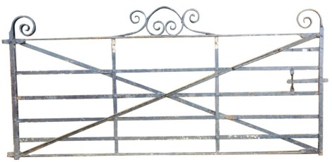 A large cast iron garden gate, 277cm wide, 130cm high.