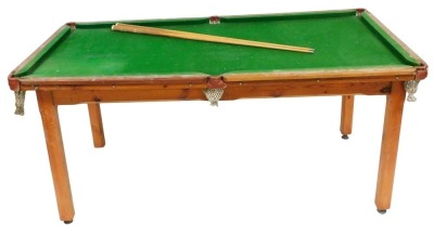 A Victor Sports pine framed half size snooker table, 84cm high x 187cm wide 98cm deep, together with two cues.