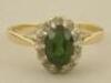 A tourmaline and tiny diamond set cluster dress ring