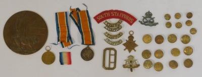 Three World War I medals, named to Private AE Jones, South Staffordshire Regiment, 14787, comprising War Medal, Victory Medal, and 1914-15 Star, together with widow's penny, in case, cloth badges, military buttons, cap badges, etc., together with... - 3