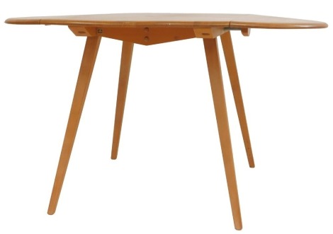 An Ercol elm drop leaf dining table, the top with a rounded edge, raised on square tapering out swept legs, model number 384, 70cm high, the top 105cm x 64cm, 128cm extended.