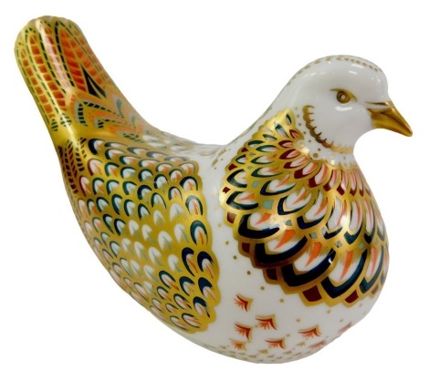 A Royal Crown Derby porcelain turtledove paperweight, red printed marks and gold stopper, 8.5cm high, boxed.