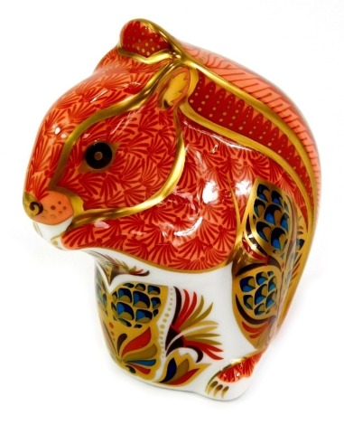 A Royal Crown Derby porcelain red squirrel paperweight, red printed marks and gold stopper, 9cm high, boxed.