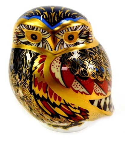 A Royal Crown Derby porcelain little owl paperweight, red printed marks and gold stopper, 8cm high, boxed.