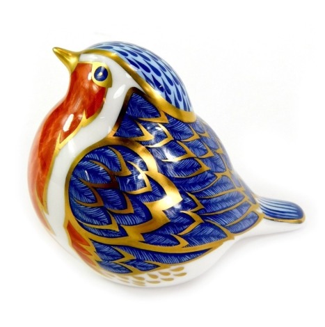 A Royal Crown Derby porcelain robin paperweight, red printed marks and gold stopper, 7cm high, boxed.