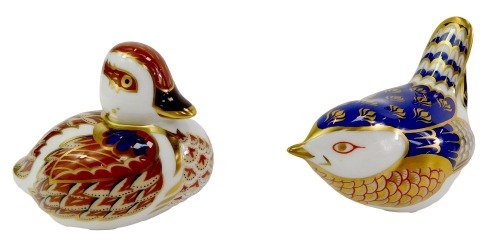 Two Royal Crown Derby porcelain bird paperweights, comprising duckling, red printed marks and gold stopper, 6cm high, and wren, red printed marks and gold stopper, 7cm high, boxed.