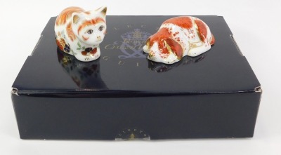 Two Royal Crown Derby porcelain paperweights, comprising Puppy, an exclusive for the Royal Crown Derby Collectors Guild, red printed marks and gold stopper, 9cm long, and Spice, Collectors Guild kitten, red printed marks and gold stopper, 6cm... - 2