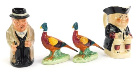 A Royal Doulton miniature character jug, modelled as Winston Churchill, 11.5cm high, together with a Tony Wood miniature Toby jug, and two Beswick style pheasants.