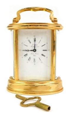 A 20thC brass cased carriage clock, the rectangular white enamel dial bearing Arabic and Roman numerals, marked L'Epee Fondee en 1839, Sainte Susanne France, the case of oval form, with glass panel to top, sides and back, the movement marked Made...